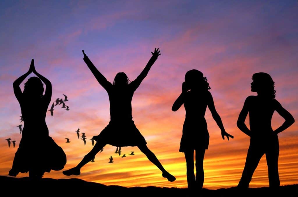 silhouette of teen girls